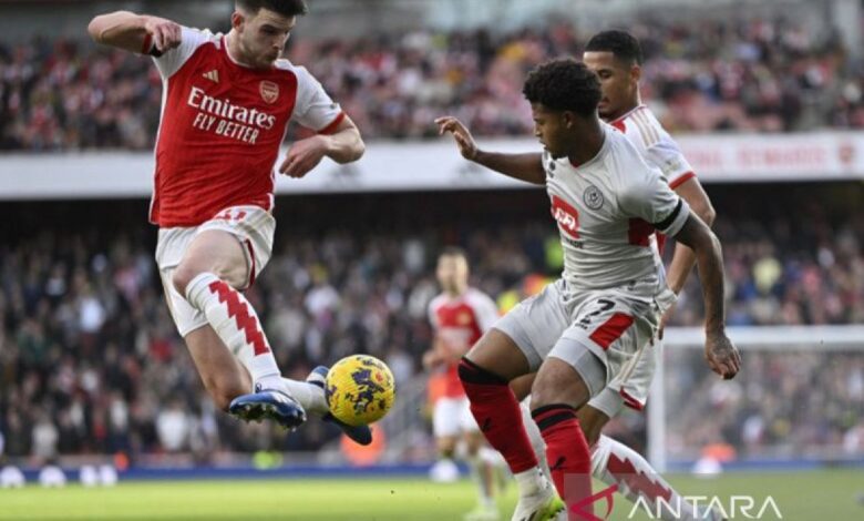 Arsenal lolos ke perempat final setelahnya menang agregat 9-3 melawan PSV